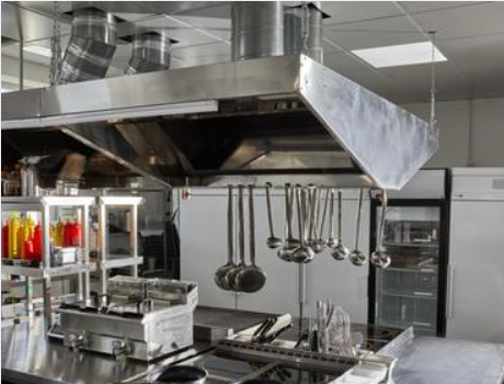 Professional kitchen equipment and storage areas